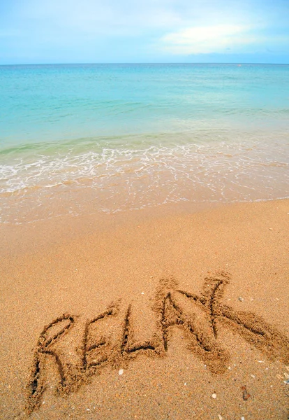 Relax written in sand — Stock Photo, Image