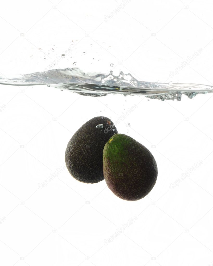 Avocadoes Splashing in water