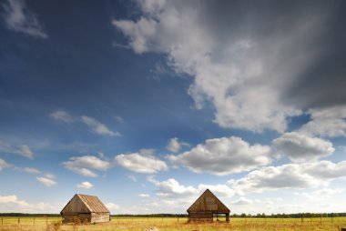 Two barn in the field clipart