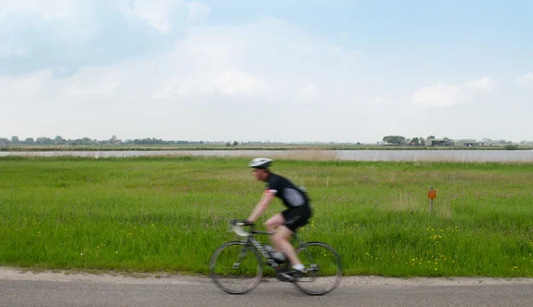Швидкий велосипедист — стокове фото