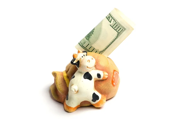 stock image Funny ceramic cow with money