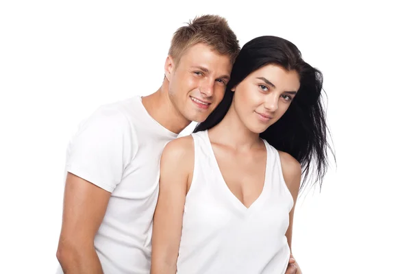 カジュアルな服装で幸せな若いカップル — ストック写真