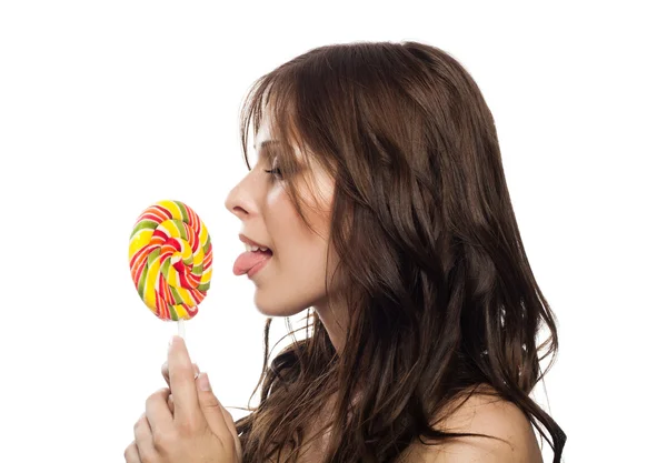 Pretty young woman with lollipop candy — Stock Photo, Image