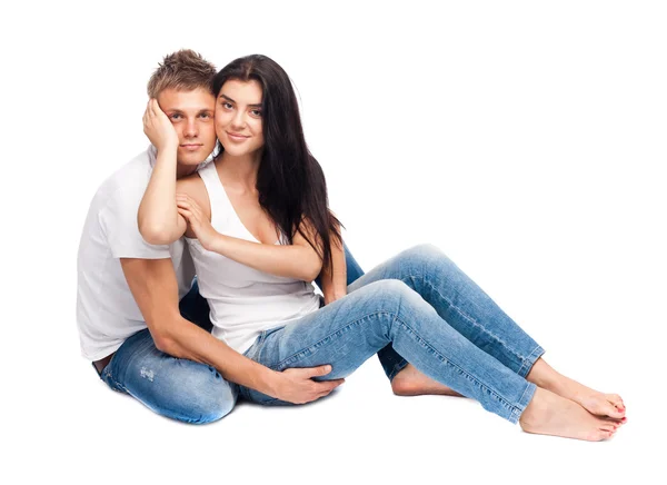 Glückliches junges Paar in lässiger Kleidung — Stockfoto