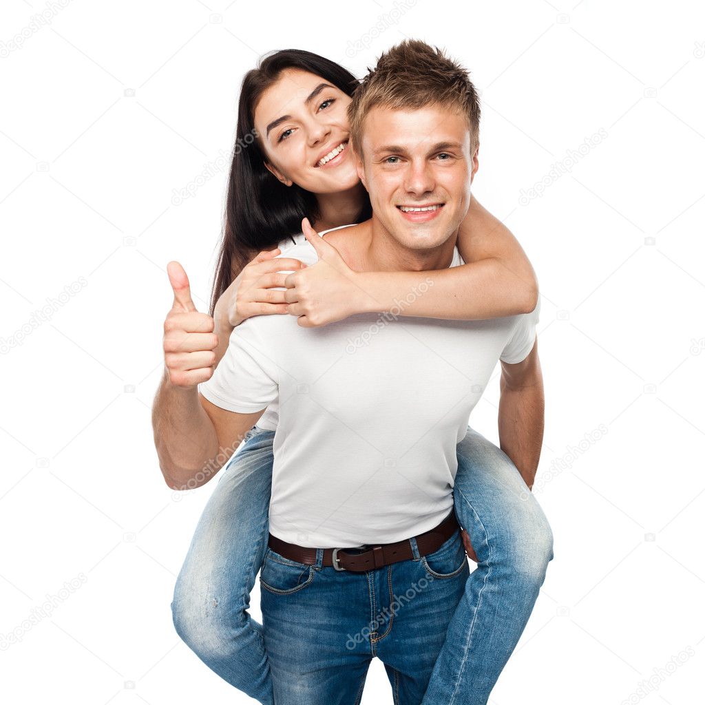 Happy young couple with his thump up
