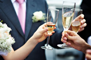 A toast to newlyweds at wedding clipart