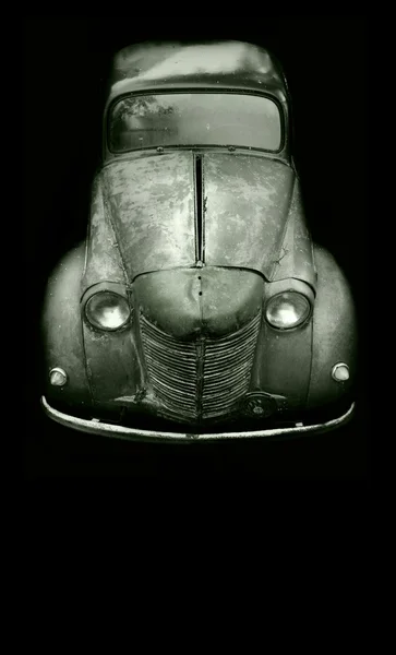 Old car on the black backgrounds — Stock Photo, Image