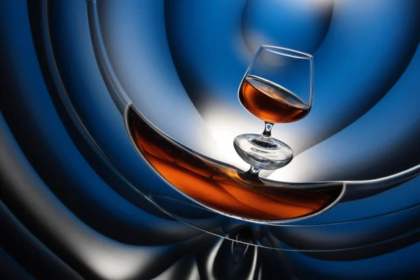 stock image Glass of brandy and reflection on blue