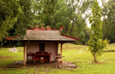 A Buddhist Prayer Hut in a Chinese Cemetery clipart