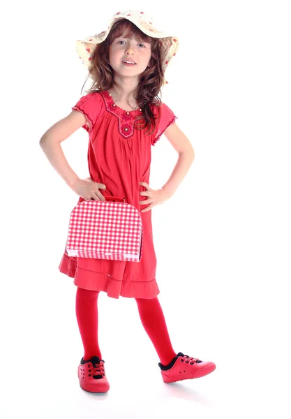 Wesoła dziewczyna z czerwonej małej walizki — Zdjęcie stockowe