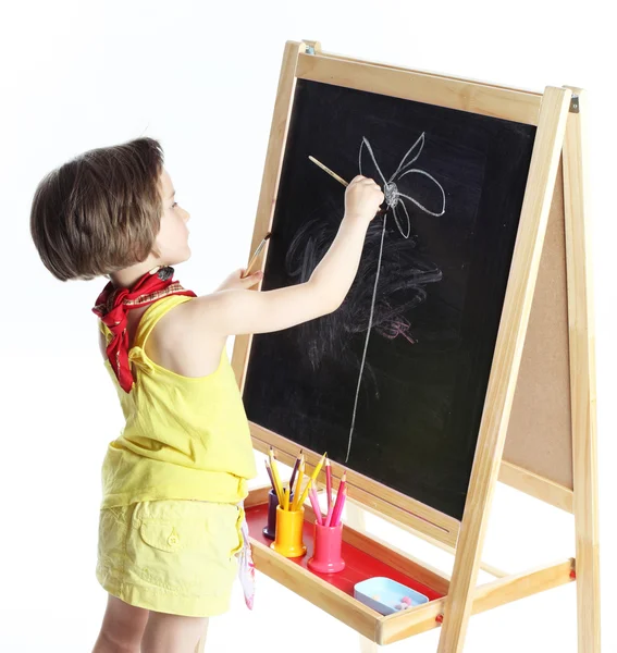A menina desenha em uma tábua — Fotografia de Stock