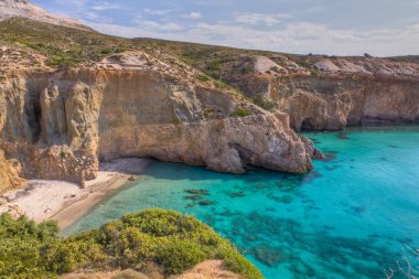 Tsigrado beach, Milos island, Cyclades, Greece clipart