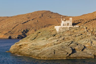 Merichas port lighthouse, Kythnos island, Cyclades, Greece clipart