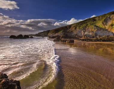 Reflections on Whitsand Bay, Cornwall, UK clipart