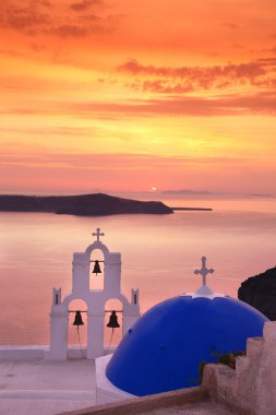 Santorini island with church and sea-view in Greece clipart