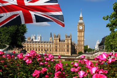 Big Ben with flag of England, London, UK clipart