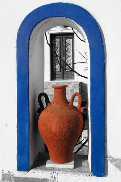 stock image Traditional Greek Vase with old door in Santorini, Fira, Greece