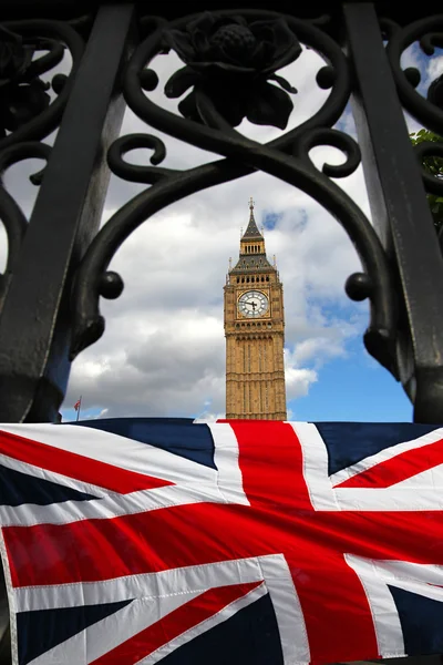 Big Ben with colorful flag of England in London — Stock Photo, Image