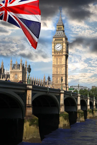 Big Ben with colorful flag of England in London — Stock Photo, Image