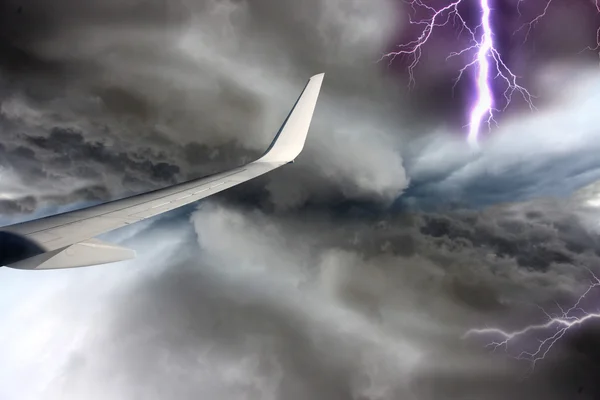stock image Airplane on blue sky with lightning