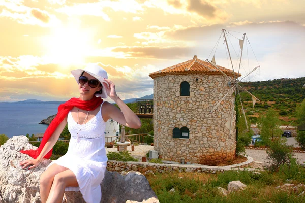 Woman with Greek windmill, Zakynthos Island — Stock Photo, Image