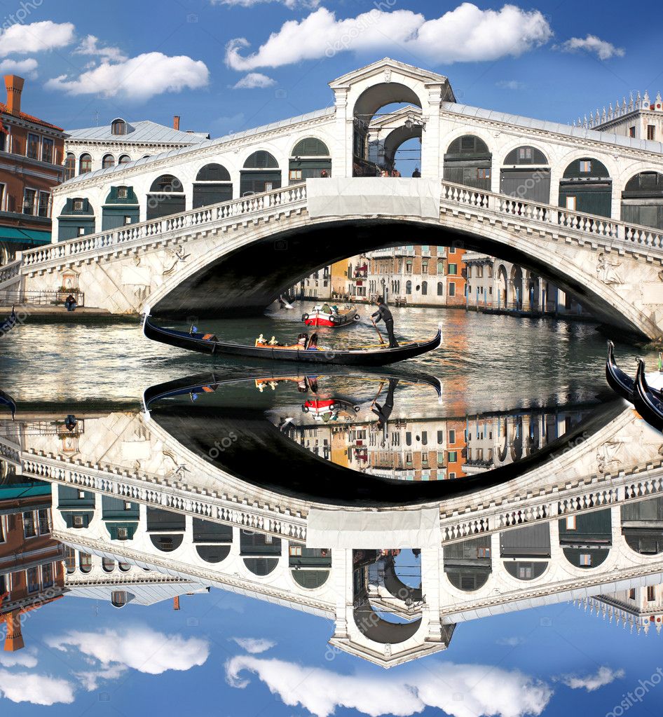 Venice, Rialto bridge with gondola in Italy
