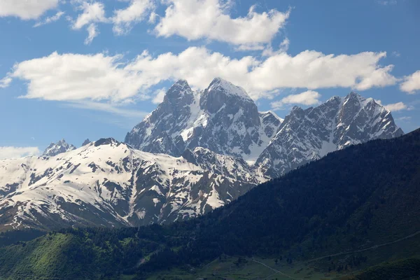 View of Double peaks of Mt. Ushba. Near Mulakhi Village. Upper Svaneti. Georgia. — Stock Photo, Image