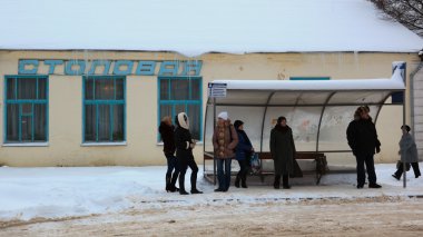 waiting for a bus on a bus stop. Gagarin (former Gzhatsk) clipart