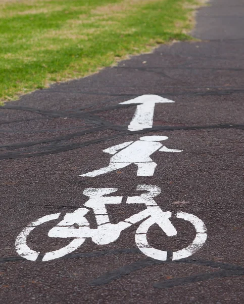 stock image White bicycle track sign painted on the road. Melbourne. Australia.