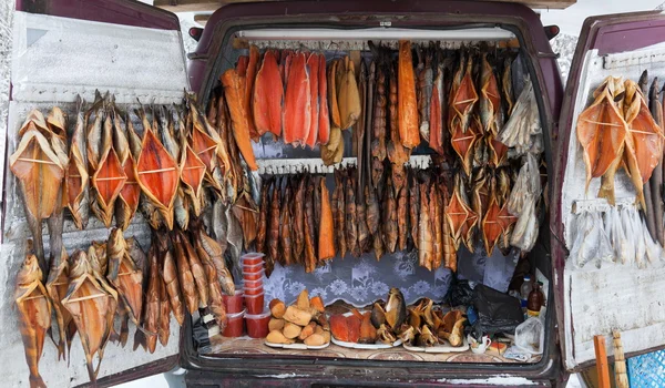 stock image Smocked fish for sale from back of a van. Smolensk highway. Russ