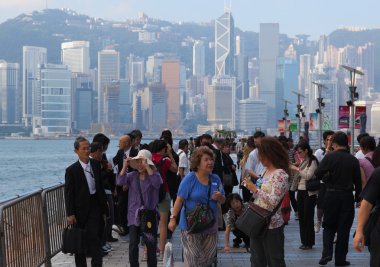 Inflow of China mainland tourists on Avenue of Stars.Tsim Sha Tsui. Hong Kong. clipart