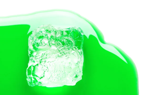 Ice cube in mint syrup — Stock Photo, Image