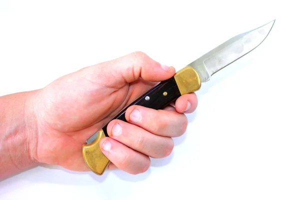 Ruka držící kapesní nůž — Stock fotografie