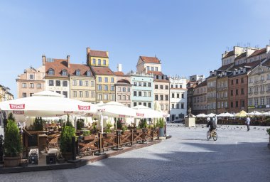 Old Town Market Place in Warsaw, Poland, at morning clipart
