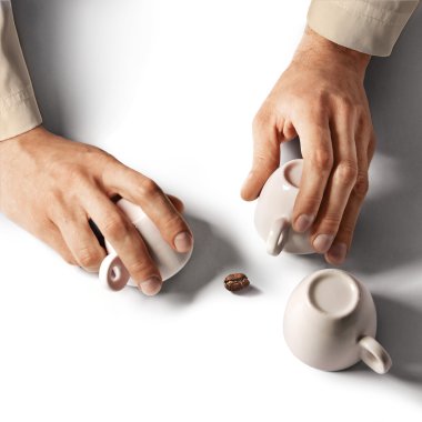 Shell game with three cups clipart