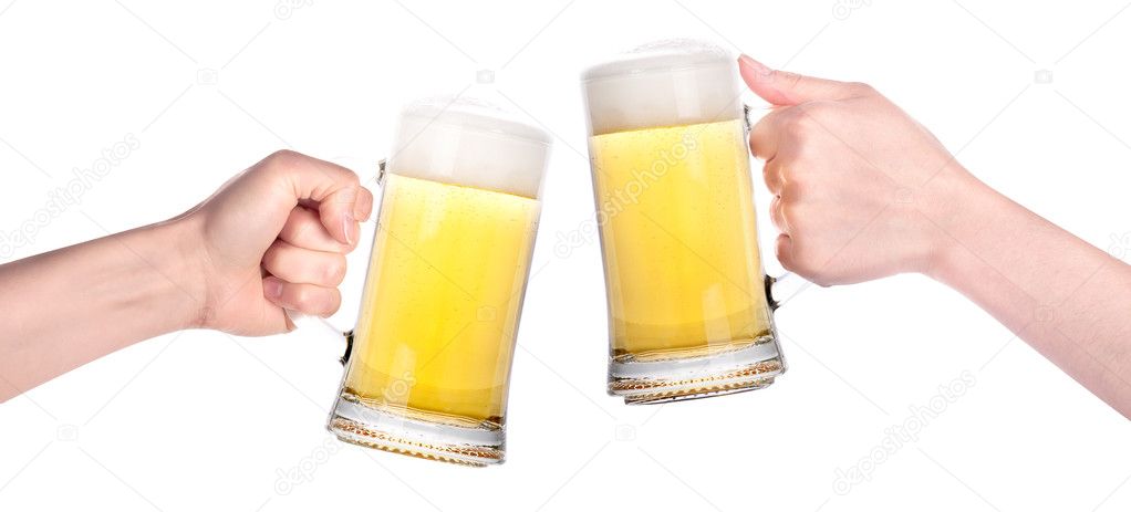 Pair of beer glasses with hand making a toast isolated