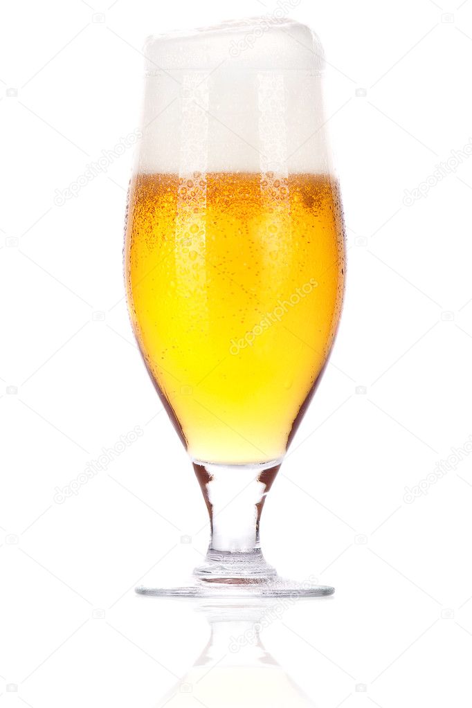 Frosty glass of light beer with foam isolated