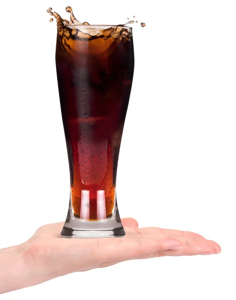 Woman hand offering fresh Cola with ice cubes — Stock Photo, Image