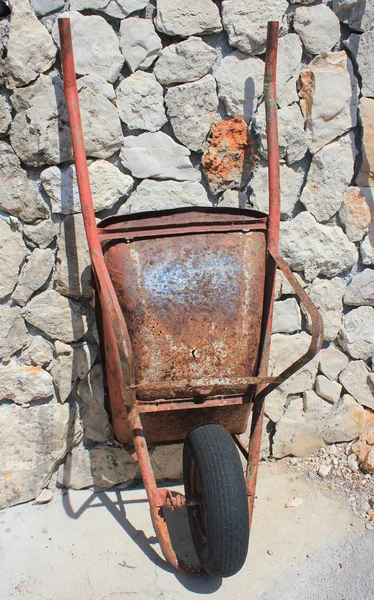 stock image Rusty old wheelbarrow