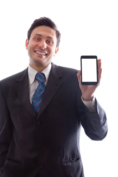 Businessman holding a smartphone and smiling — Stock Photo, Image