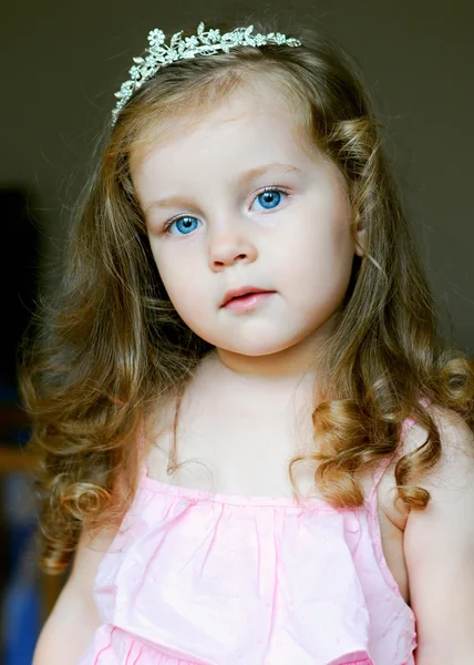 Beautiful little girl dressed as a princess with long hair — Stock Photo, Image