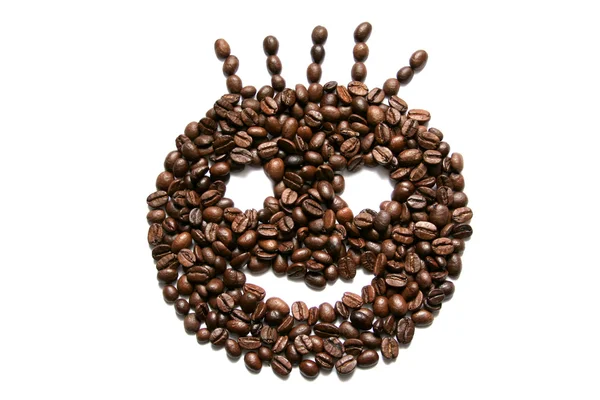 Beyaz arka plan üzerinde izole şeklinde bir gülümseme kahve çekirdekleri — Stok fotoğraf