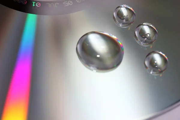 Abstrato gotas de água no disco — Fotografia de Stock