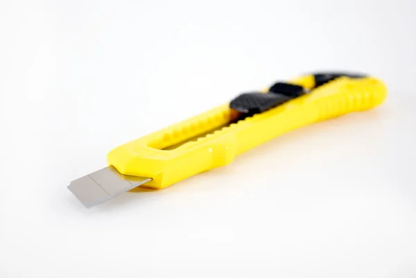 Cuchillo utilitario amarillo Imagen De Stock