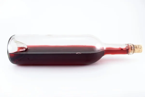 Rode wijn in fles Stockfoto