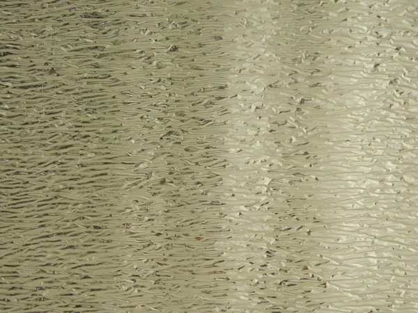 Shiny wrinkled sheet of metal foil — Stock Photo, Image