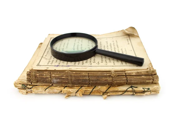 stock image Old ancient books and lens