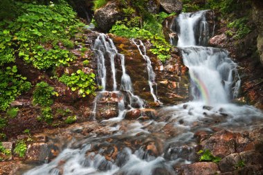 Hidden place at the Screaming Waterfall at Caraiman (Bucegi moun clipart