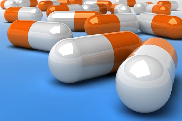 Pillole arancioni medicina sfondo — Foto Stock
