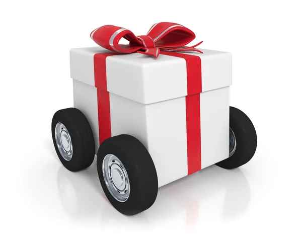 Біла подарункова коробка з колесами — стокове фото